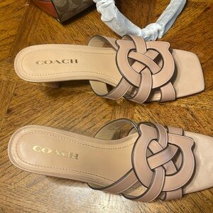 Coach sandals in beige or bone .   Worn twice